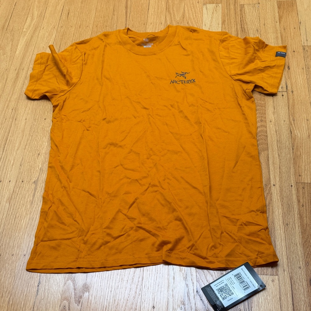 NWT medium bird emblem SS t shirt 100% cotton orange Arc'teryx Mens aspen Orange
